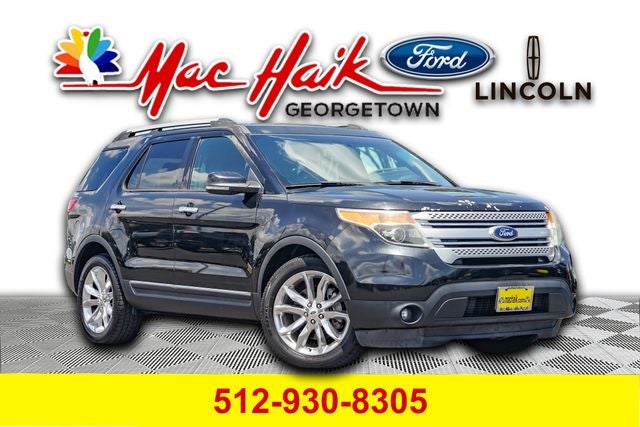 2013 Ford Explorer XLT in Tuxedo Black Metallic — front three-quarter view