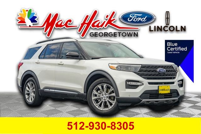 2023 Ford Explorer XLT in White Metallic — front three-quarter view