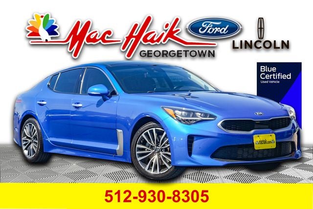 2018 Kia Stinger Premium in Micro Blue — front three-quarter view