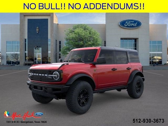 2026 Ford Bronco Badlands® in Ruby Red Metallic Tinted Clearcoat — front three-quarter view