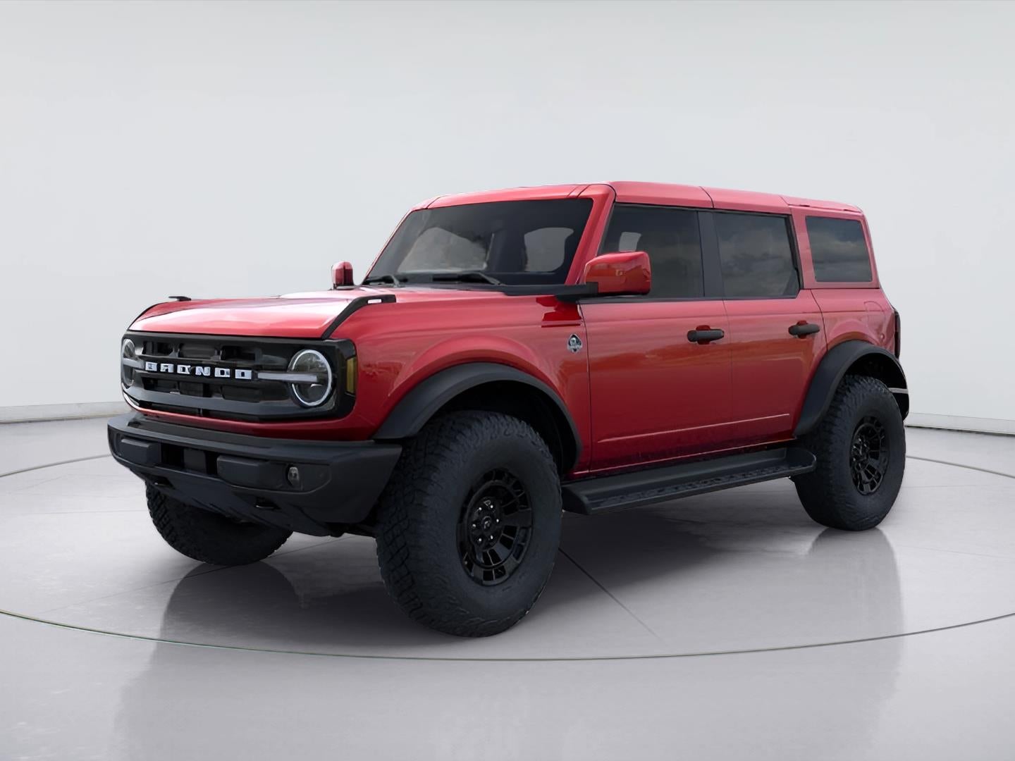 2026 Ford Bronco Outer Banks in Ruby Red Metallic — front three-quarter view